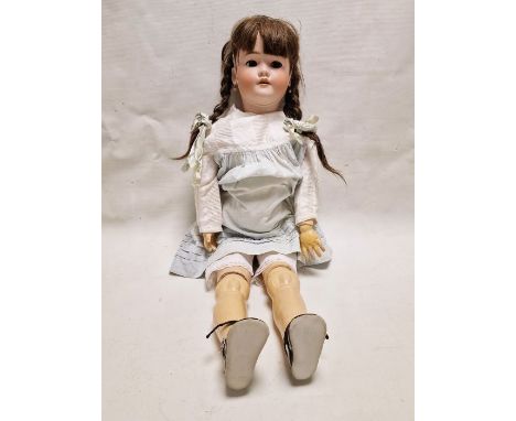 Heinrich Handwerck bisque headed doll&nbsp;with sleeping brown eyes, brown wig, pierced ears and open mouth, ball jointed bod