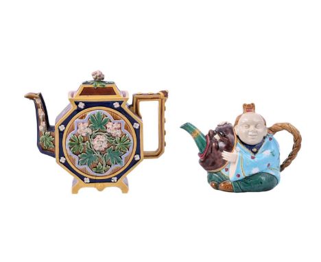 A Minton majolica teapot and cover modelled as a Chinese figure, date code for 1874, faintly impressed marks, 13cm high, toge