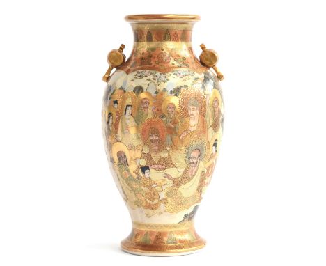A Japanese Meiji period vase of baluster form, with twin handles in the form of 'Uchide no Kozuchi', the mythological mallet 