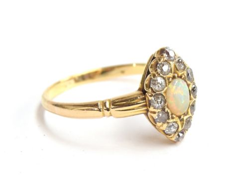 An 18ct gold diamond and opal marquise ring, size Q 1/2, approx. 3.1g 