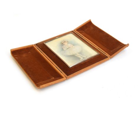 An early 20th century 9ct gold picture frame containing a portrait miniature on ivory of a young ballerina, 15x11.5cm, in a f