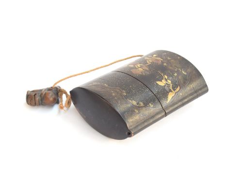 A 19th century Japanese three case black lacquer inro, with gilt hiramakie decoration, one side depicting flora, the other a 