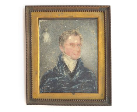 A 19th century portrait miniature on ivory of a gentleman in Regency dress, in a brass frame, 8.5x7cmProvenance: the Peto Fam