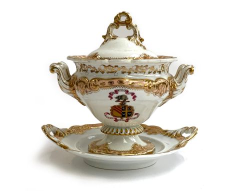 A 19th century footed tureen and cover, with stand, bearing hand painted armorial crest of a porcupine and martlet 'Vires Agm