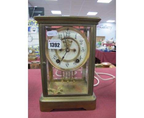 Brass Cased Mantel Clock, with bevelled glass panels, eight-day movement, Arabic numerals to cream chapter ring, 24.5cm high.