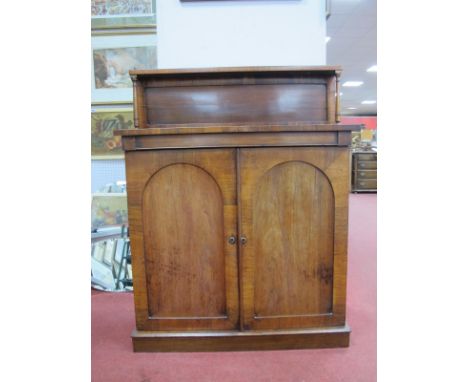 A XIX Century Rosewood Chiffonier, with gilt metal gallery to upper shelf, having pillar supports, over twin arched doors on 