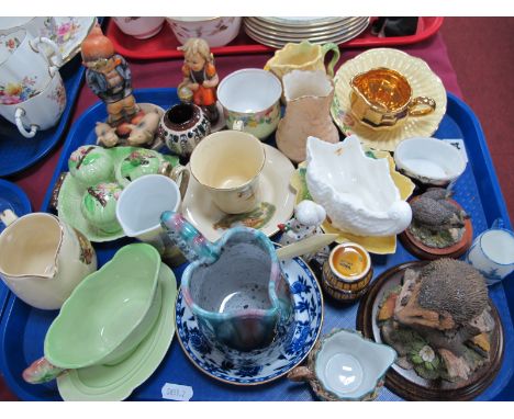 Carlton Ware "Austrian" Ware design condiments, two Hummel figures, Crown Devon cup-saucer. Border fine arts, hedgehogs, Roya