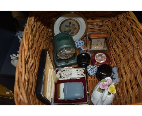 A selection of ceramic pill style cases and a Castell pencil sharpener in wicker basket