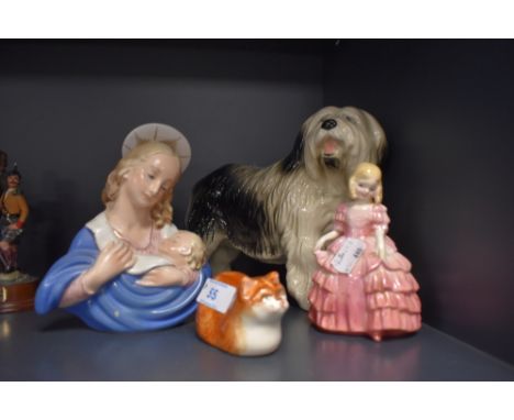 Four ceramic figurines including English sheep dog Royal Doulton Rose Jesus Christ and decorated cat