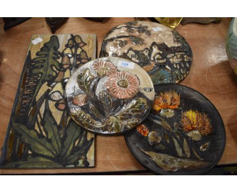 Four mid century ceramic plaques including Keramik style and bisque glaze