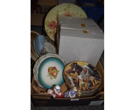 A selection of ceramic display plates of Native American interest and two Doulton figures Ivy and Lavinia