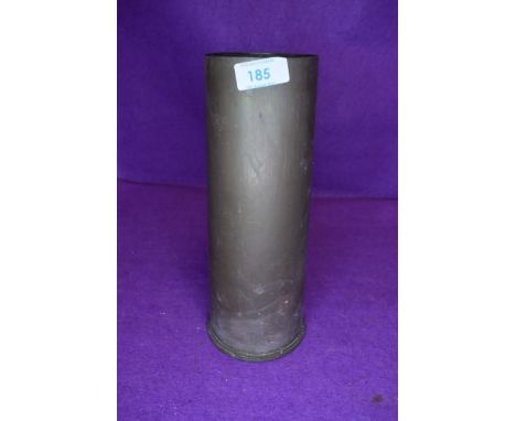 A large brass military ammunition shell marked 18Pr