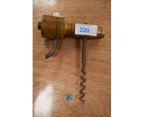 A vintage wooden barrel tap.