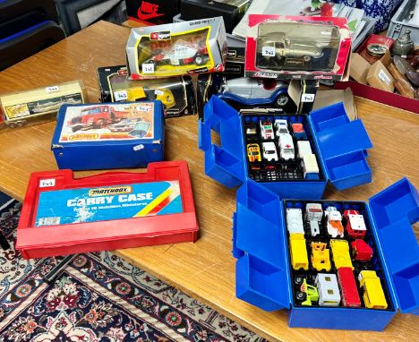 Collection of diecast models including Matchbox models, Matchbox travel cases also large scale Burago and Majorette boxed mod