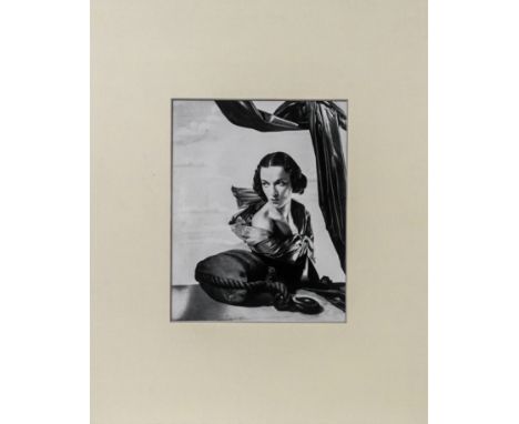 Likely a reprint -&nbsp;A gelatine silver photographic print of a female sitter, mounted, 26cm x 21cm. (Likely attributed to 