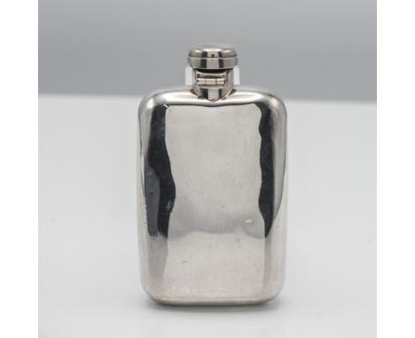 A Victorian silver hip flask, height 11cm, 3 oz.