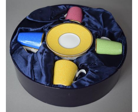 A Boxed Royal Worcester Coffee Set Comprising Four Harlequin Coffee Cans and Saucers 