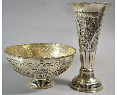 An Indian Pressed White Metal Bowl Decorated with Elephants and a Floral Decorated Trumpet Vase, 29.5cm high 