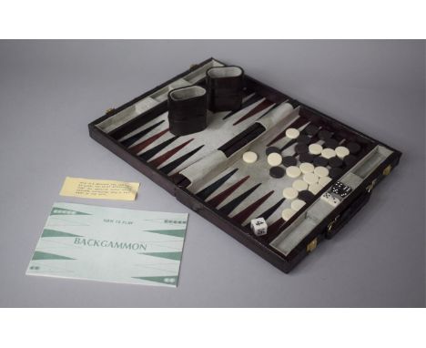 A Moder Eel Leather Cased Backgammon Set, 27.5cm wide 