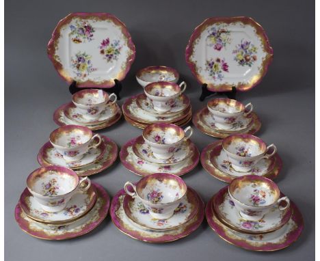 A Collection of Floral Pink and Gilt Decorated Teawares to comprise Teacups, Saucers, Side Plates, Cake Plates, retailed by L