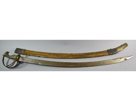 An Indian Brass Mounted and Handled Curved Blade Sword in Velvet Scabbard 