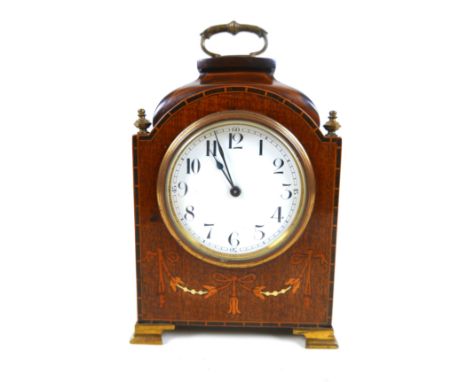 An Edwardian inlaid mahogany mantel clock with a Buren movement, with key, 14 by 23cm.Not currently running. 