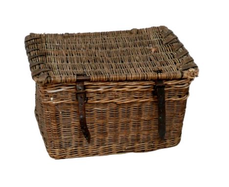 A vintage wicker hamper, with brown leather straps, 65 by 44 by 39cm high. 