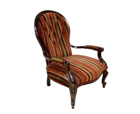 A Victorian style fireside button back open armchair with jazz striped material, 64 by 78 by 89cm high.in good overall condit