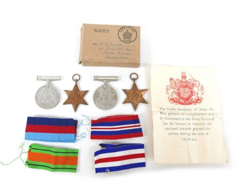 A group of four WWII medals awarded to L. C. Lawson, comprising 1939-45 Star, France & Germany Star, 1939-45 War Medal, and D