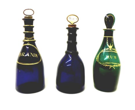 A group of three 18th century glass decanters, comprising a Bristol green decanter, with gilt painted 'Rum' to the neck, face