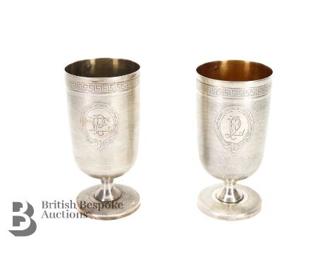 Charles-Alexandre Lavallee of Paris a pair of silver chalice, having engine-turned decoration, with greek-key design to the l