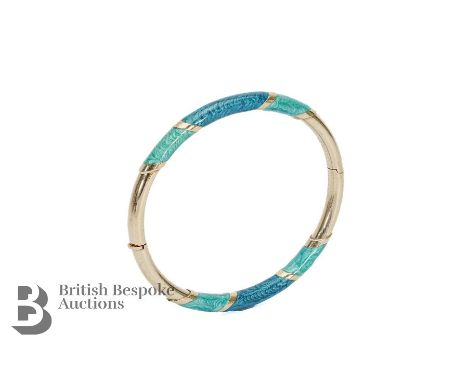 9ct yellow gold and green enamel bangle, inner diameter 62 x 55mm, approx 13.7 gms.&nbsp;