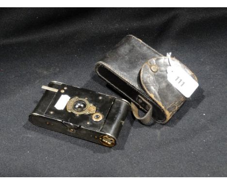 A World War 1 Period Vest Pocket Kodak Camera Together With Its Case