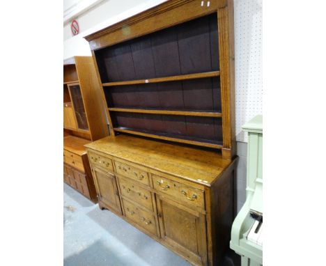 A 19th Century Oak Welsh Dresser Having A Three Shelf Rack The Base Having An Arrangement Of Cupboards & Drawers, 65" Wide