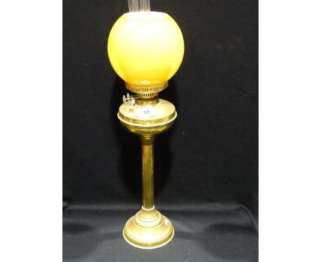 A Circular Based Brass Column Oil Lamp