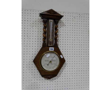 An Oak Framed Wall Barometer