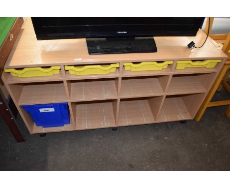 Modern light wood side cabinet with plastic drawers