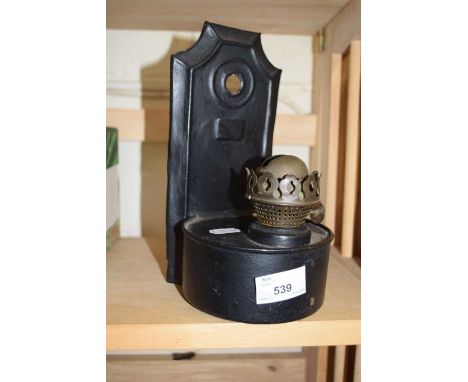 Wall mounted oil lamp