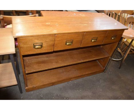 Light oak side cabinet with four drawers