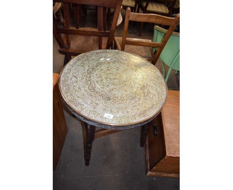 Circular brass top occasional table