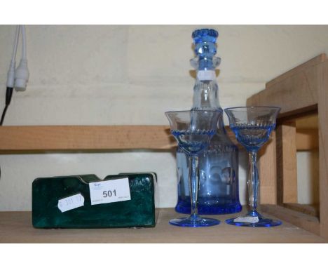 Blue glass spirit decanter with glasses and a further heavy glass ashtray