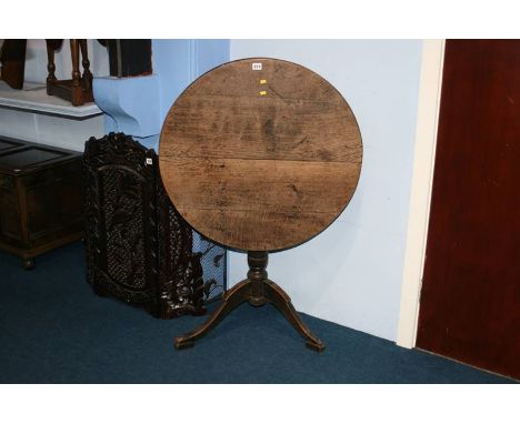 A Georgian oak tripod table