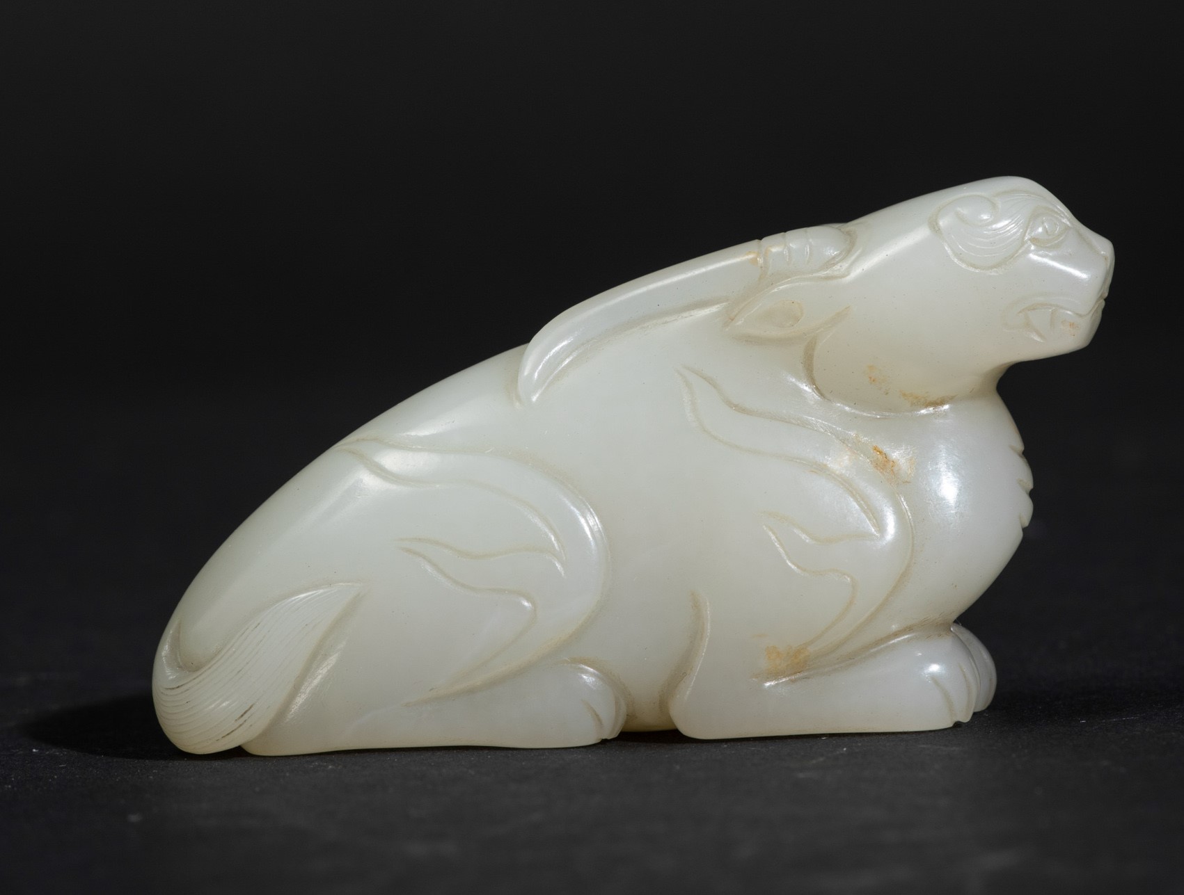 A white jade figure, China, Qing Dynasty Qianlong period (17361796). 7cm