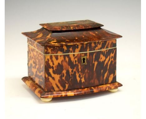 19th Century tortoiseshell sarcophagus shaped tea caddy, the hinged cover opening to reveal a lift-off cover enclosing a two 