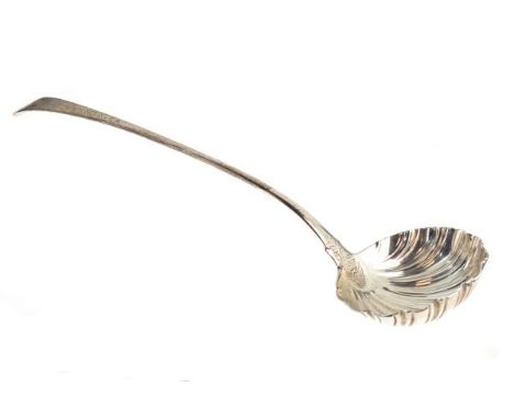George III silver Old English pattern punch ladle the handle with engraved and chased decoration and having a scalloped bowl,