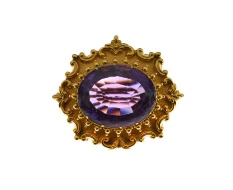 Victorian amethyst gold brooch/clasp, unmarked, the oval cut stone approximately 2.4cm x 1.9cm,  16.1g gross  Condition: Over