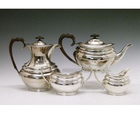 George V silver four piece tea service of oval form, makers Lee & Wigfull, Sheffield 1926 and 1932, height of hot water jug 2