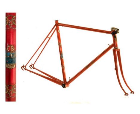 Claud Butler steel racing cycle frame having lugless construction in metallic red with gold decals and Olympic Rings, having 