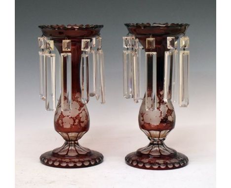 Pair of Bohemian ruby flash glass lustre drop vases, each having engraved grapevine decoration, 28.5cm high  Condition: There