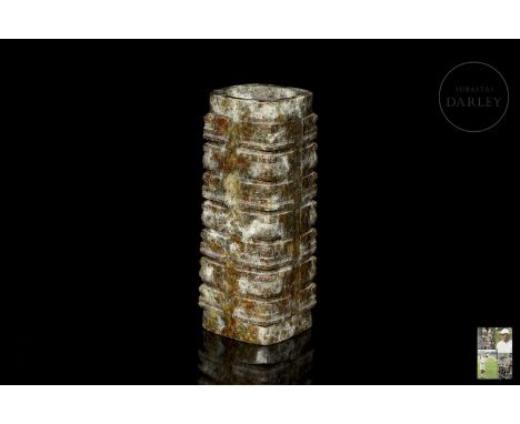 Beautiful greenish jade, with reddish, ochre and amber flecks. Carved in the traditional ‘cong’ shape, with a rectangular ext